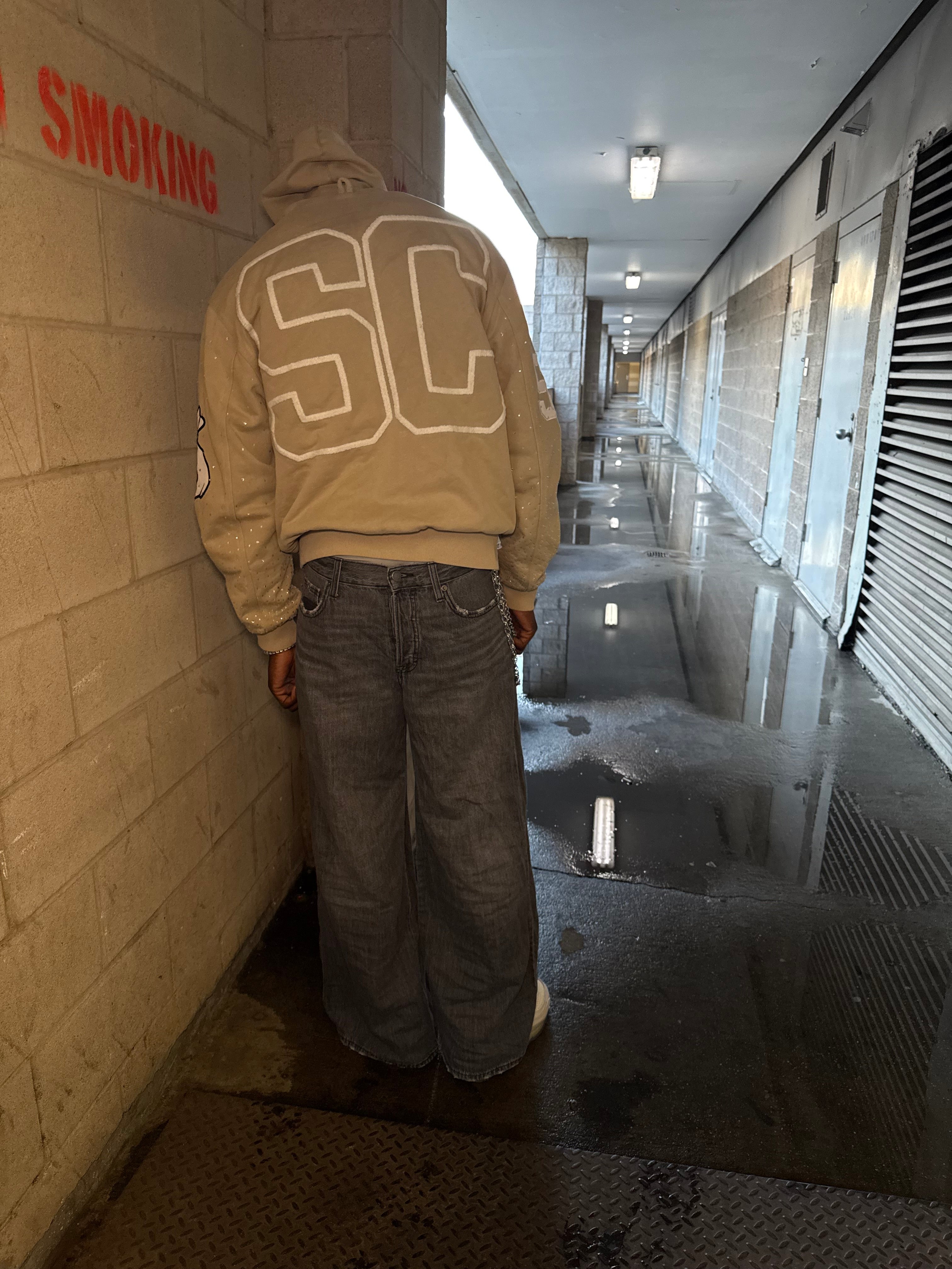 Tan "Bag Chaser" zip up jacket