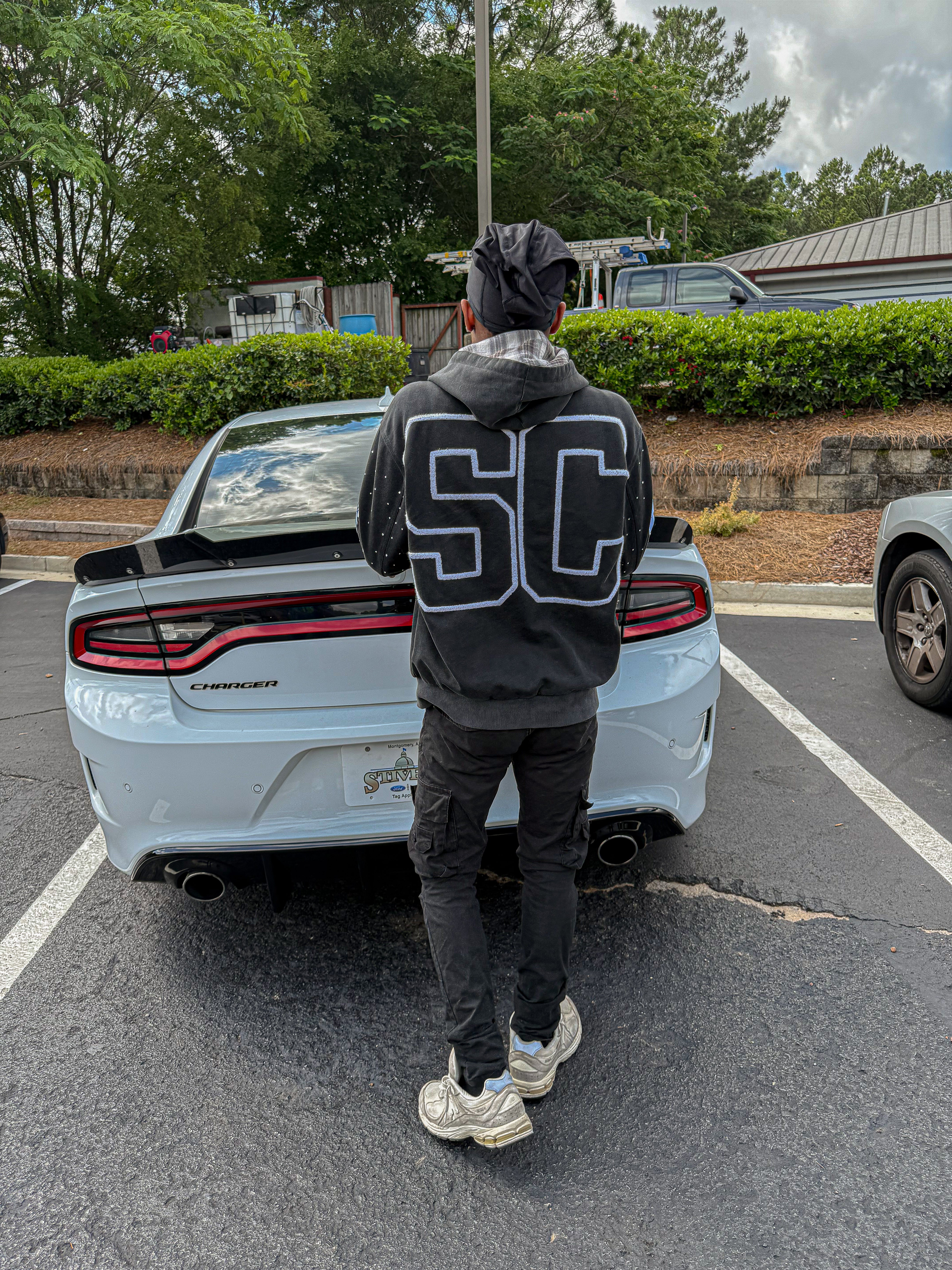 Black "Bag Chaser" zip up jacket